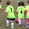 Julia dribbles the ball